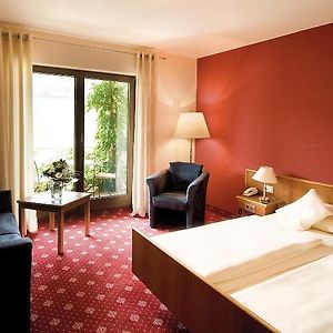 Zimmer mit Kingsize-Bett